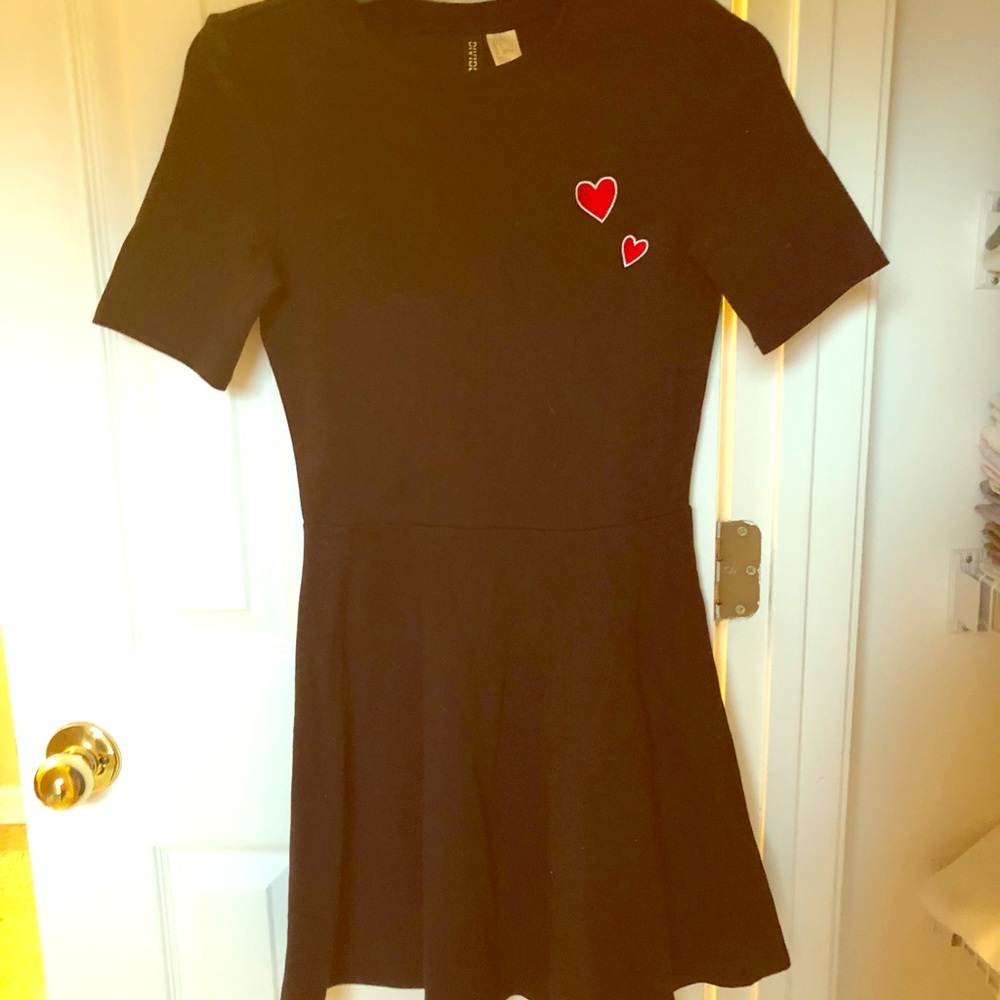 black shirtsleeve dress with red heart